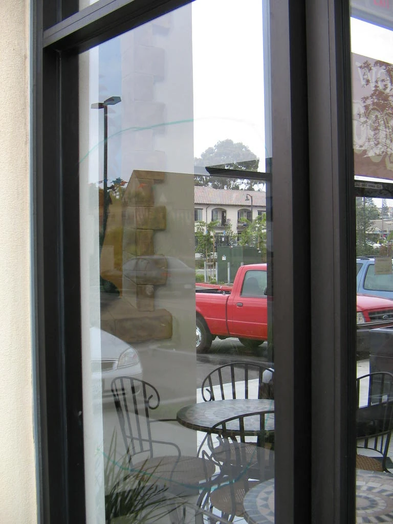 Glass-door application context. Appearance alone does not prove safety-glazing compliance.