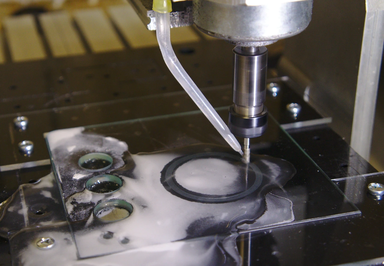 CNC diamond-tool glass milling with water at the tool head