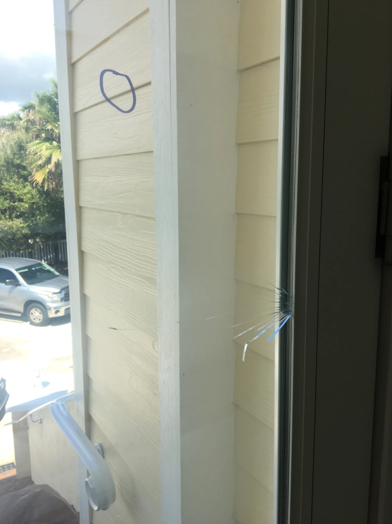 Real installed window with edge-origin crack