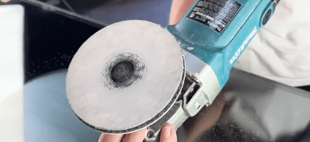 Abrasive material-removal stage on glass
