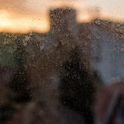 Hard-water staining on glass